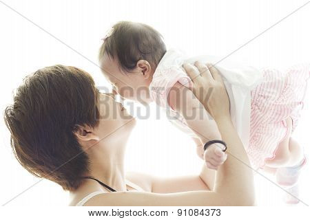 Happy Mother And Smile Baby