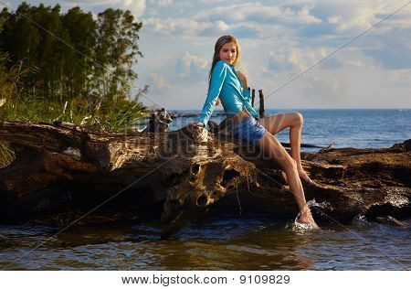 Blonde Posing Near Flotsam