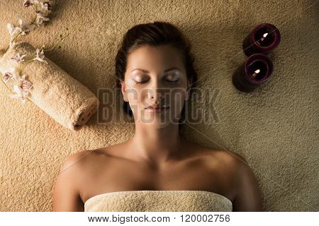 The girl relaxes in the spa