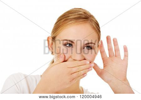 Shocked young woman overhears conversation