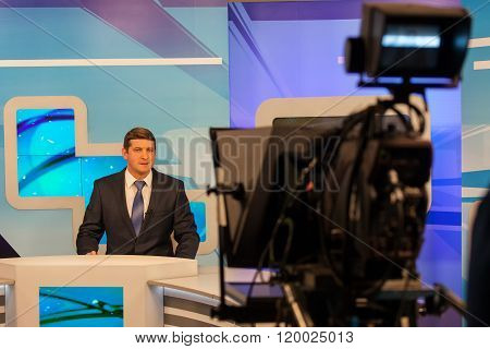 Tv Studio Camera Recording Male Reporter Or Anchorman. Live Broadcasting