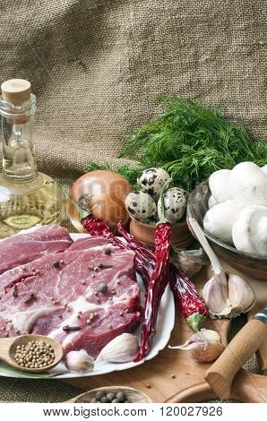 Fresh Meat With Mushrooms Spices And Herbs.