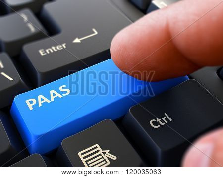 Pressing Blue Button PAAS on Black Keyboard.