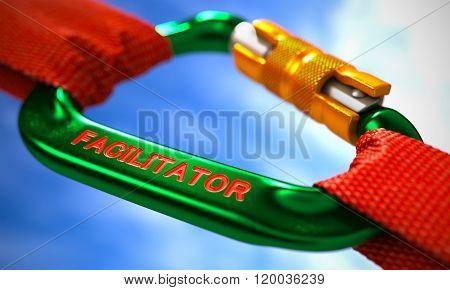 Facilitator on Green Carabine with a Red Ropes.