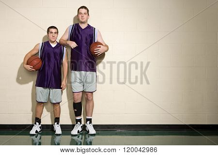 Tall and short basketball players