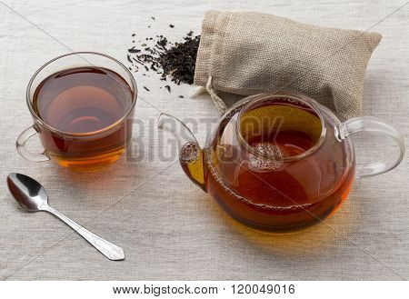 Glass Cup And Teapot Freshly Brewed Black Tea
