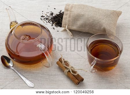 Glass Cup And Teapot Freshly Brewed Black Tea