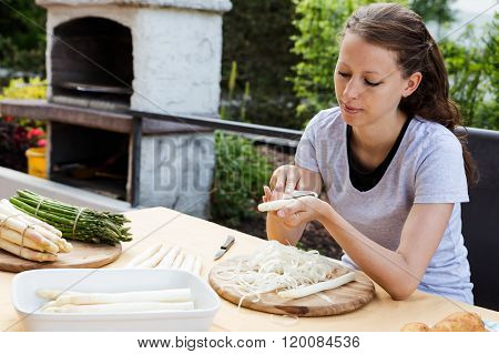Woman With Green And White Asparagus