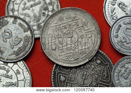 Coins of Nepal. Hindu trishul depicted in the Nepalese rupee coins.