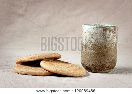 Communion table with bread and wine over cloth