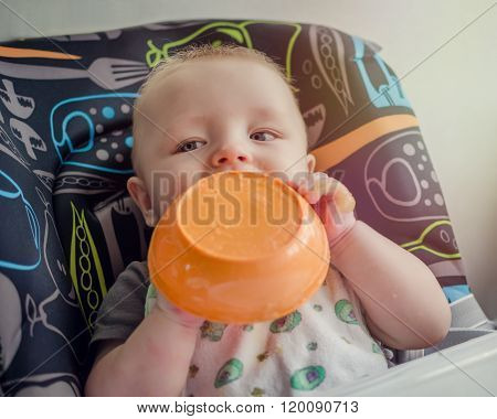 Adorable Baby Learning To Feed Himself For The First Time