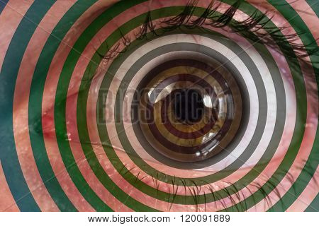 Psychedelic hypnosis swirl eyeball optical illusion background