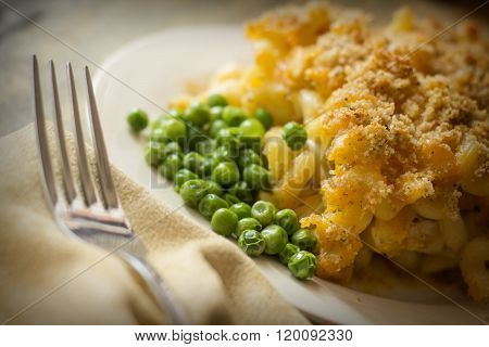 Home made baked macaroni and cheese with crispy bread crum topping