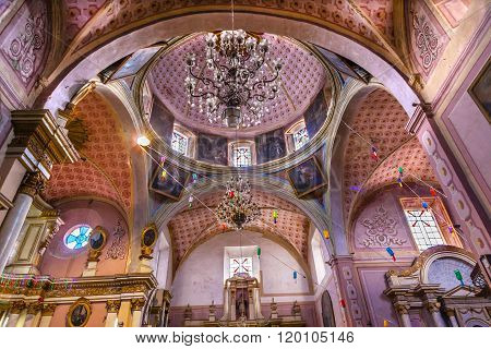 SAN MIGUEL DE ALLENDE, MEXICO - DECEMBER 27, 2014 Basilica Dome Templo Del Oratorio De San Felipe Neri Church Facade San Miguel de Allende Mexico. Built in 1700s named for San Felipe Neri from Florence who founded Oratorio Catholic Order