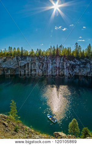 Tourist boat mouring in Marble Canyon under the sun