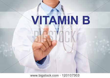 Doctor hand touching Vitamin B sign on virtual screen.