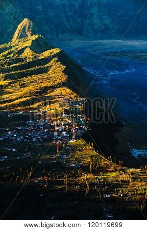 Village near cliff at Bromo Volcano in Tengger Semeru national park Java Indonesia