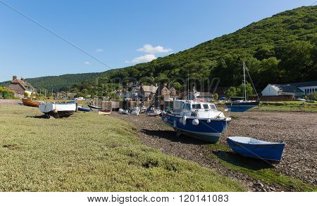 Porlock Weir Somerset England UK near Exmoor Heritage with boats at low tide in summer