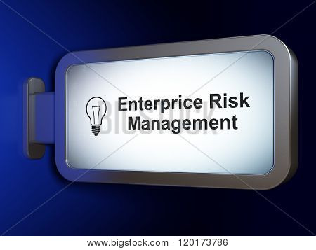 Finance concept: Enterprice Risk Management and Light Bulb on billboard background