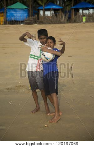 AGONDA, INDIA - OCTOBER 13, 2015: Unidentified children at Agonda beach at Goa India. This 3 km beach in South Goa is famous as a Ridley turtle nesting site.