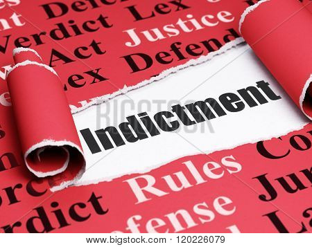 Law concept: black text Indictment under the piece of  torn paper