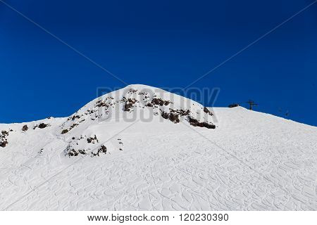 Snowy Mountains With Ski Tracers