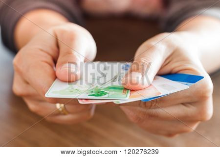 Chiang Rai, Thailand - March 3, 2016: Woman's Hand Holding Visa Card