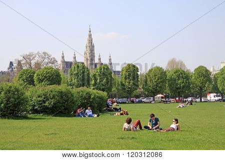 Vienna, Austria - April 25, 2013: People Relaxing In A Park In Vienna Near Hofburg Imperial Palace W