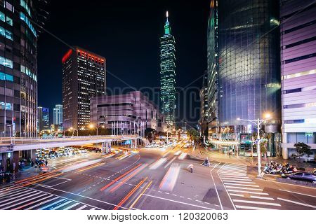 Traffic On Xinyi Road And View Of Taipei 101 At Night, In Taipei, Taiwan.