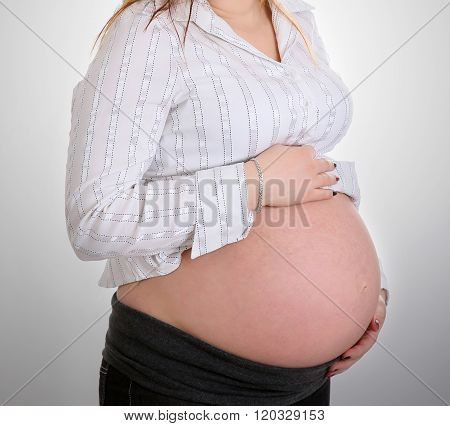 A young pregnant woman.