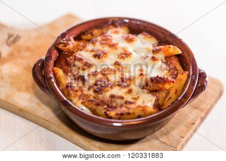penne in a pan to forn