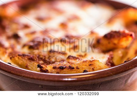 penne in a pan to forn