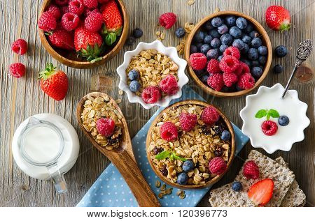 Fresh Healthy Breakfast With Muesli And Berries, Vitamins, Wooden Background