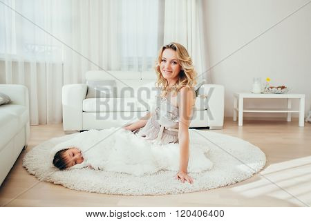 A Happy  Pregnant Woman With Son.