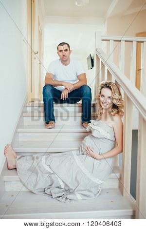 A Happy  http://www.bigstockphoto.com/ru/account/uploads/contribute?editPregnant Woman With Husband.