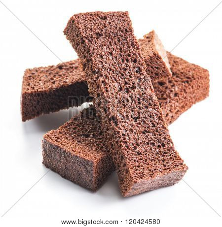 Bread croutons isolated on a white background.