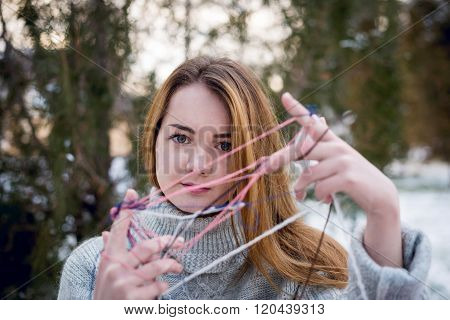 Funny Hipster Girl in Knitted Sweater