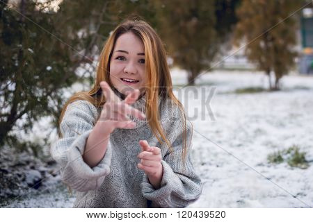 Funny Hipster Girl in Knitted Sweater