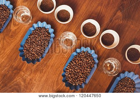 Coffee beans and ground coffee in perfect rows