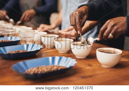 Baristas training to make the perfect cup of coffee