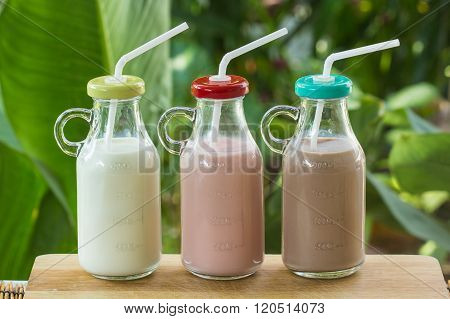 Strawberry, Chocolate And Fresh Milk Bottles