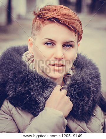 Fashion portrait of young beautiful stilish woman. Bob short hair. City lifestyle. Street fashion concept.
