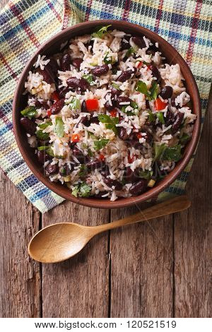 Rice With Red Beans And Vegetables In A Bowl. Vertical Top View