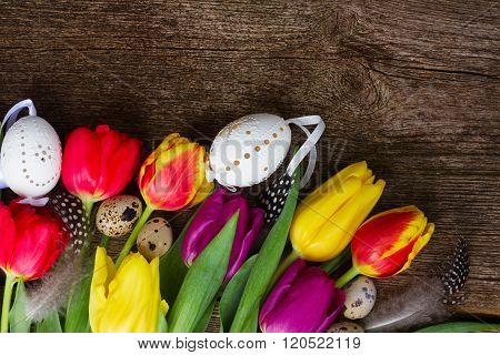 Spring flowers with easter eggs