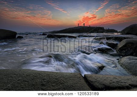 Seascape Thailand, the waves ripple rock and sunrise at the beach beautiful landscape.