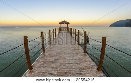 Kerachut Beach jetty at sunset. Nature composition