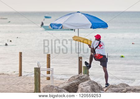 Lifeguard Patrolling The Beach