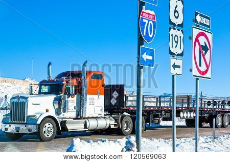 Arches, USA - January 3, 2011: Arches National Park area, a truck on the road 191.
