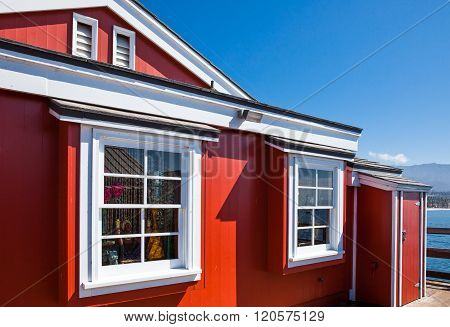 Santa Barbara, U.S.A. - June 1, 2011: Detail of a traditional red house in the Stearns Wharf on the sea front.