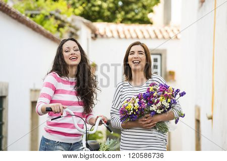 Two beautiful and happy friends smiling